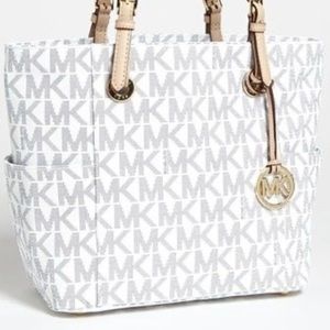MK tote bag is used but is in good condition open for offers.